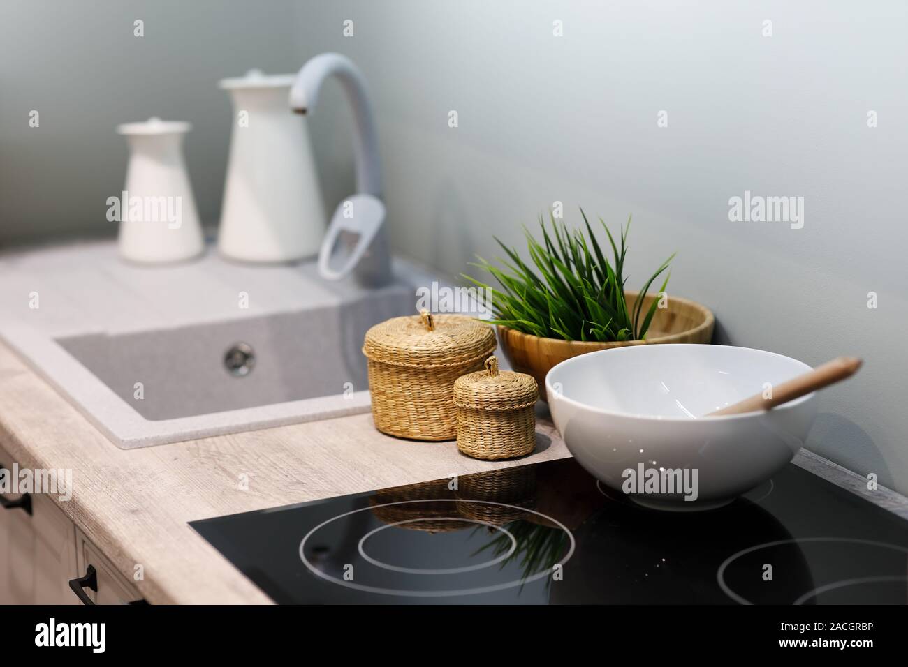 Kitchenware Pan At Small Electric Stove With Timer On Control Panel Modern  Kitchen With Wooden Surface Table And Marble Wall Tile At Blurred  Background Stock Photo - Download Image Now - iStock