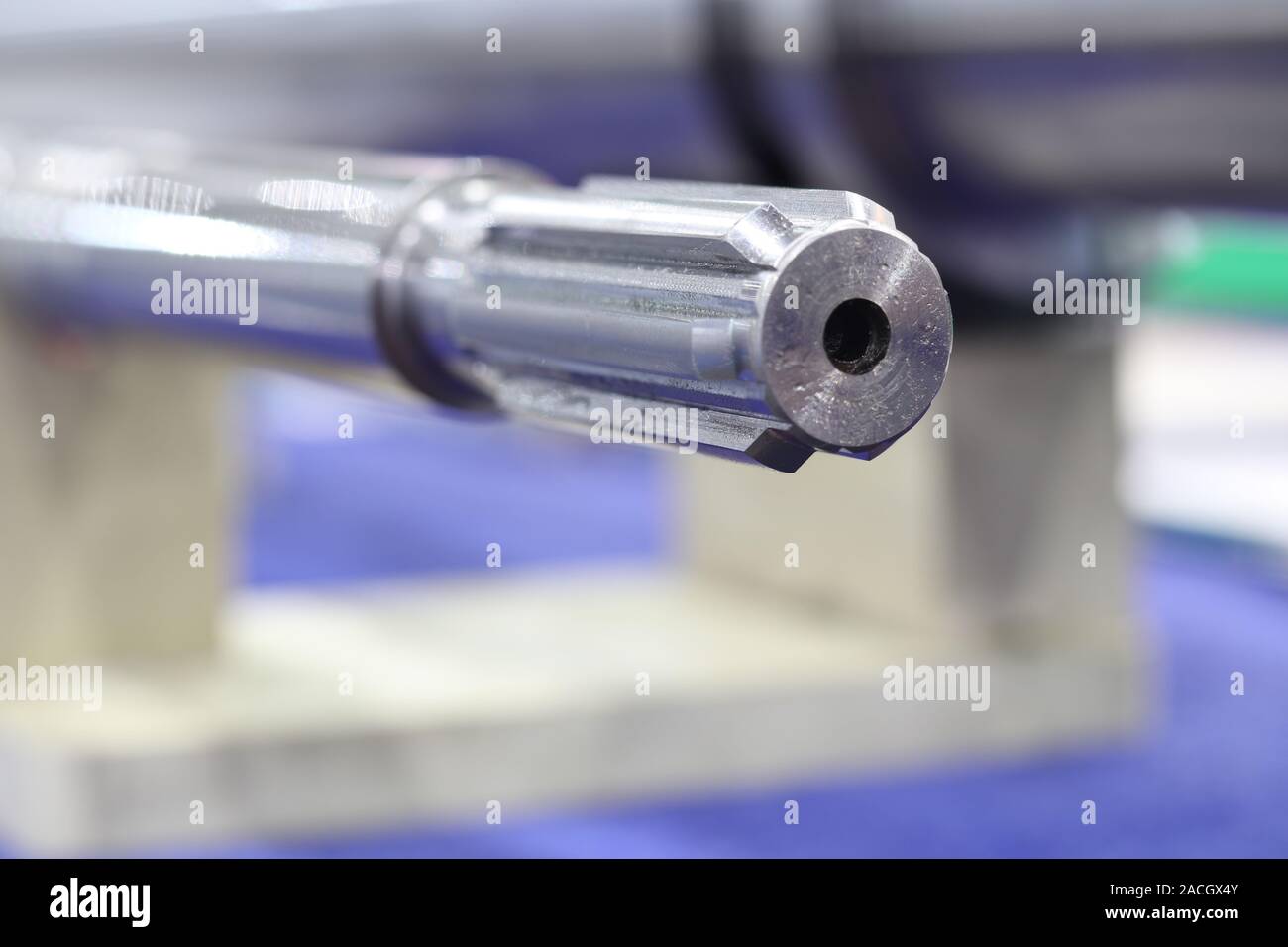Screw press parts for plastic injection machine ; selective focus Stock Photo