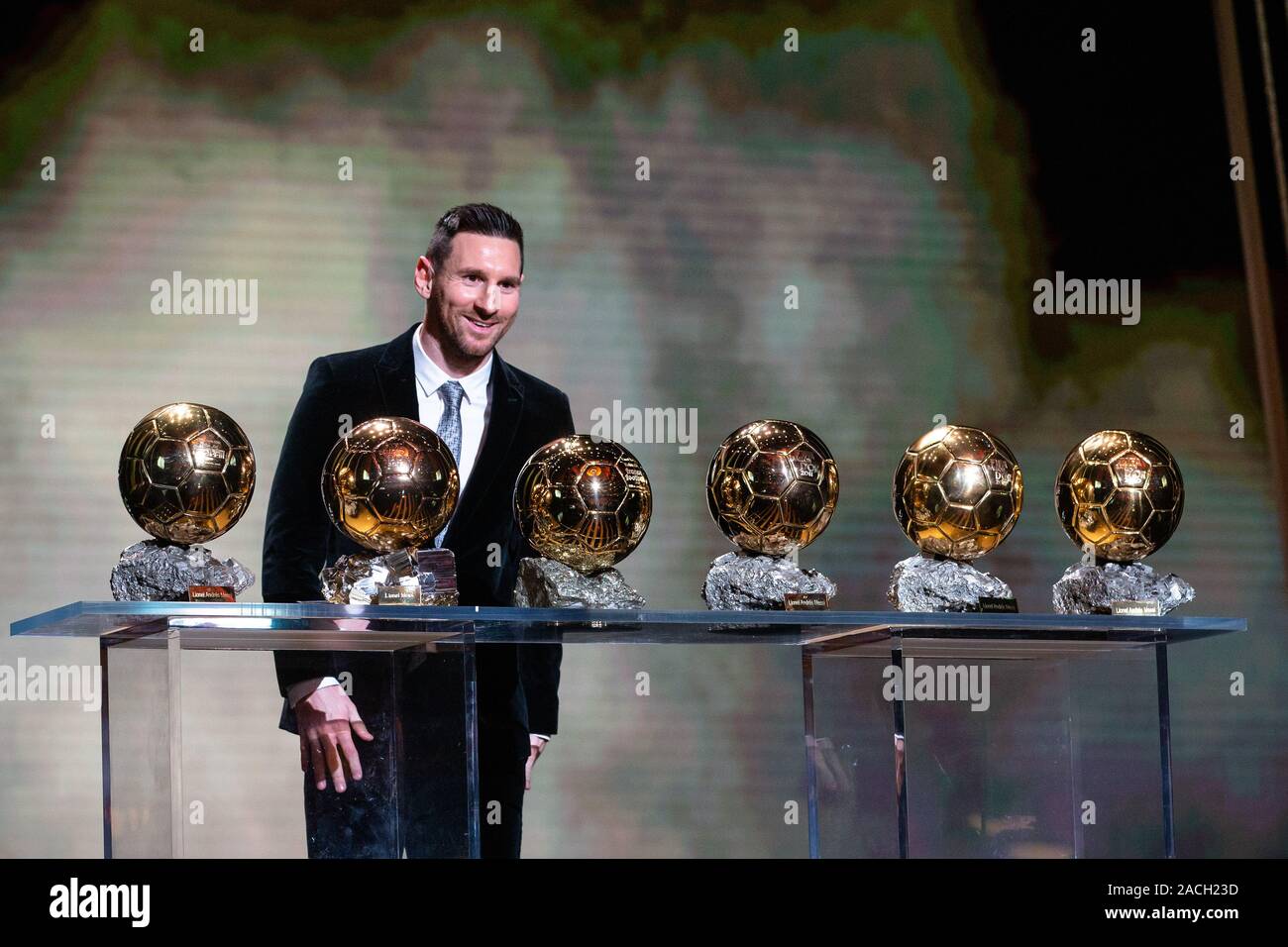 Paris, France. 2nd Dec, 2019. Barcelona's Argentinian forward Lionel Messi  poses with the trophies during the Ballon d'Or 2019 awards ceremony at the  Theatre du Chatelet in Paris, France, Dec. 2, 2019.