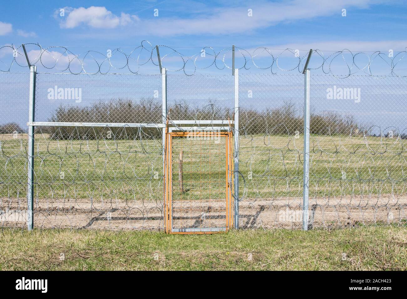 Border fence between Rastina & Bacsszentgyorgy (Hungary) with a locked ...