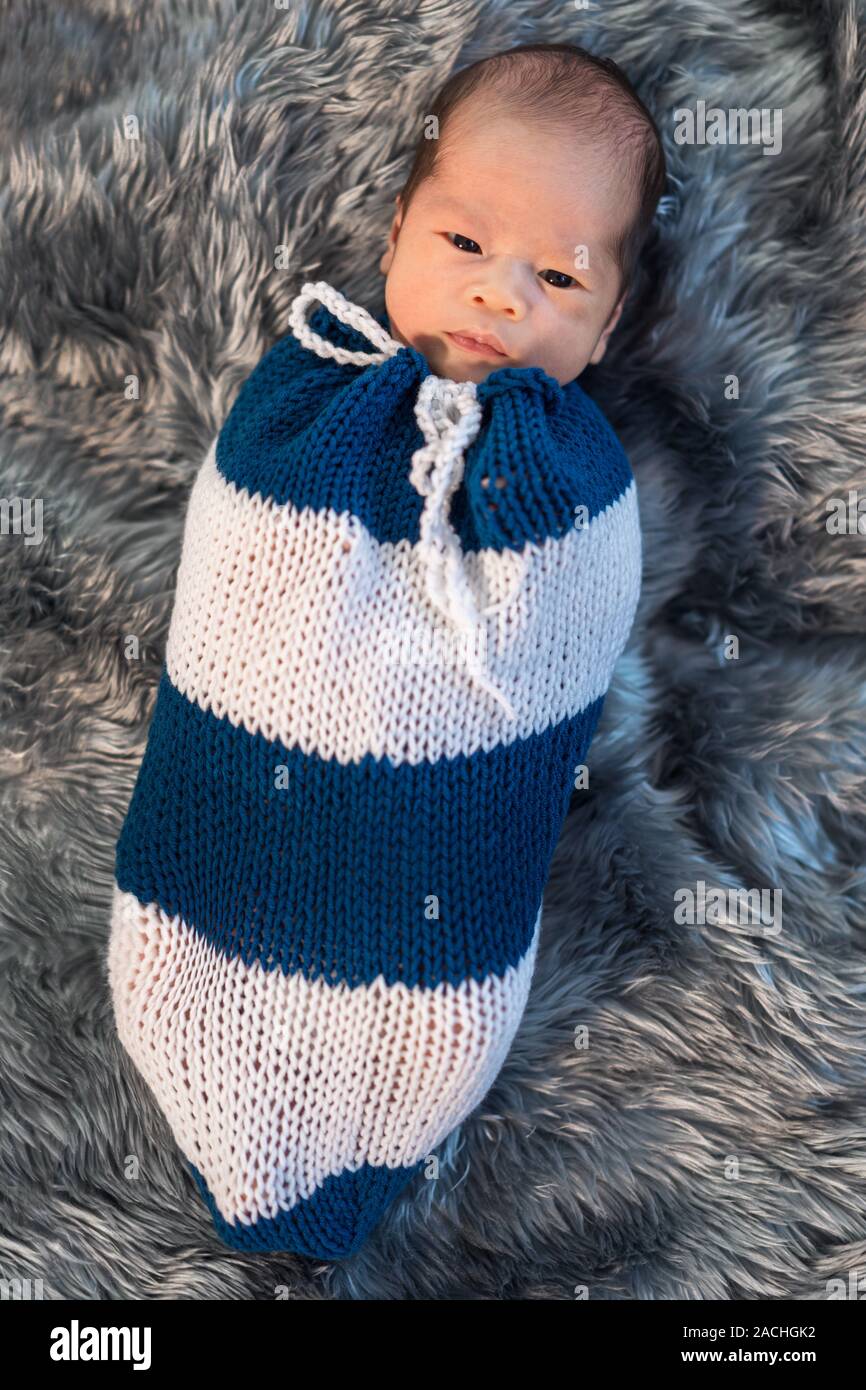 Baby wrapped blanket white background hi-res stock photography and ...