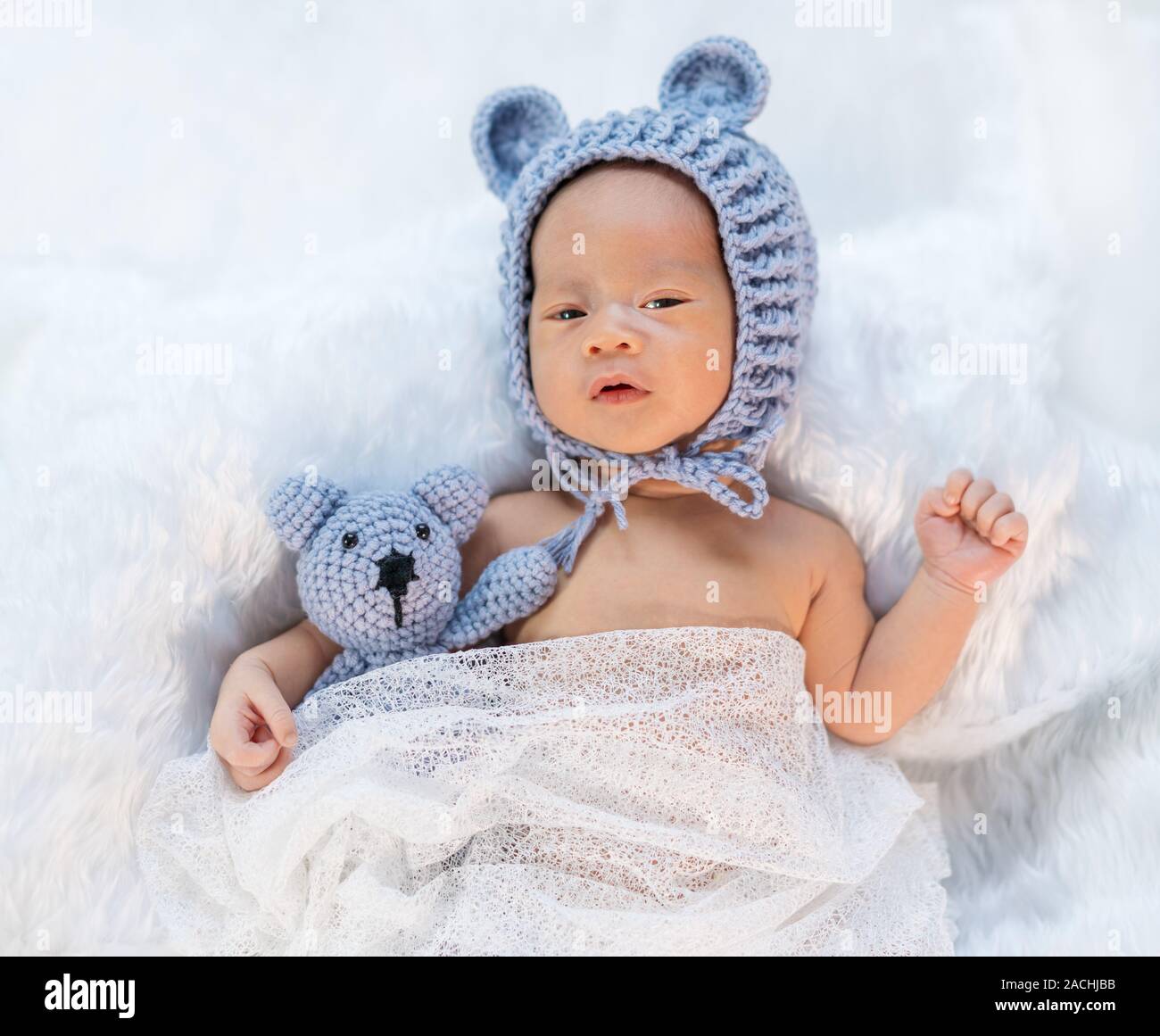 Chinese girl sleeping teddy bear hires stock photography and images