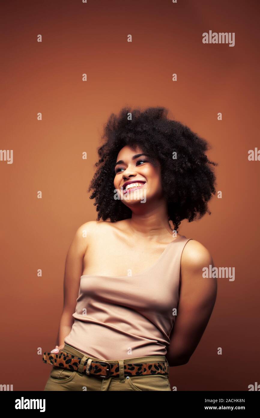 Pretty Young African American Woman With Curly Hair Posing