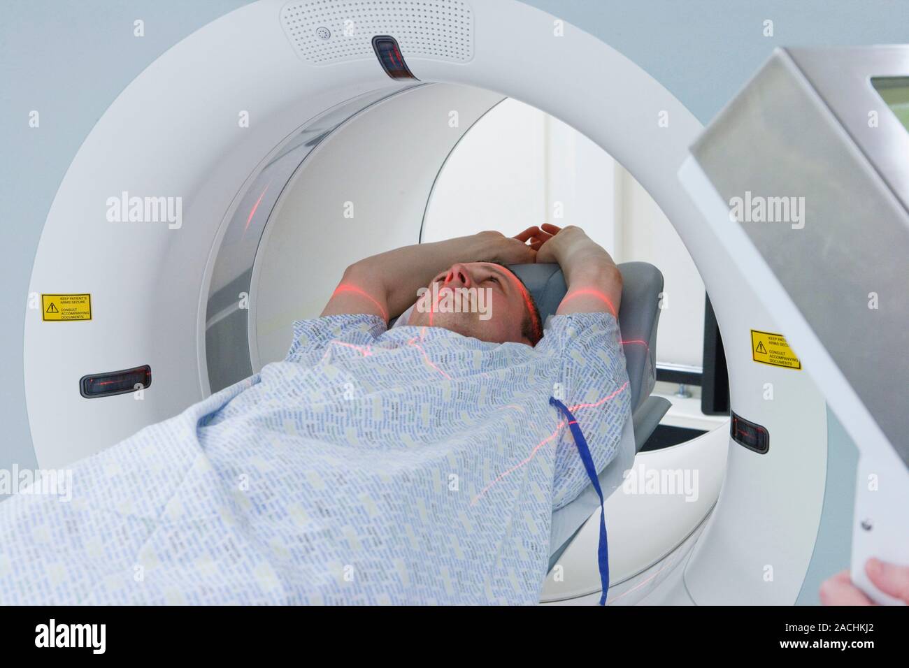 Patient in PET CT scanner in use at hospital examination room Stock ...