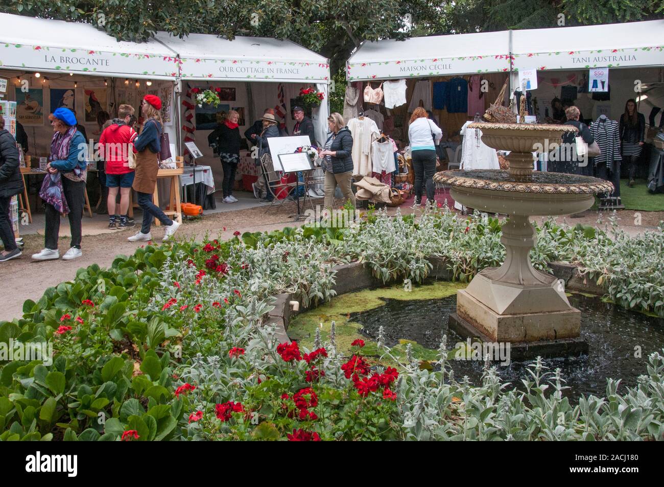 Melbourne residents celebrate French food and culture at a weekend sales promotion in the grounds of historic Como House, South Yarra. Stock Photo