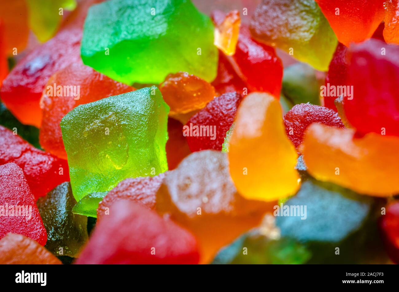 Extreme Closeup of a bunch of candied fruits or tutti frutti with selective focus Stock Photo