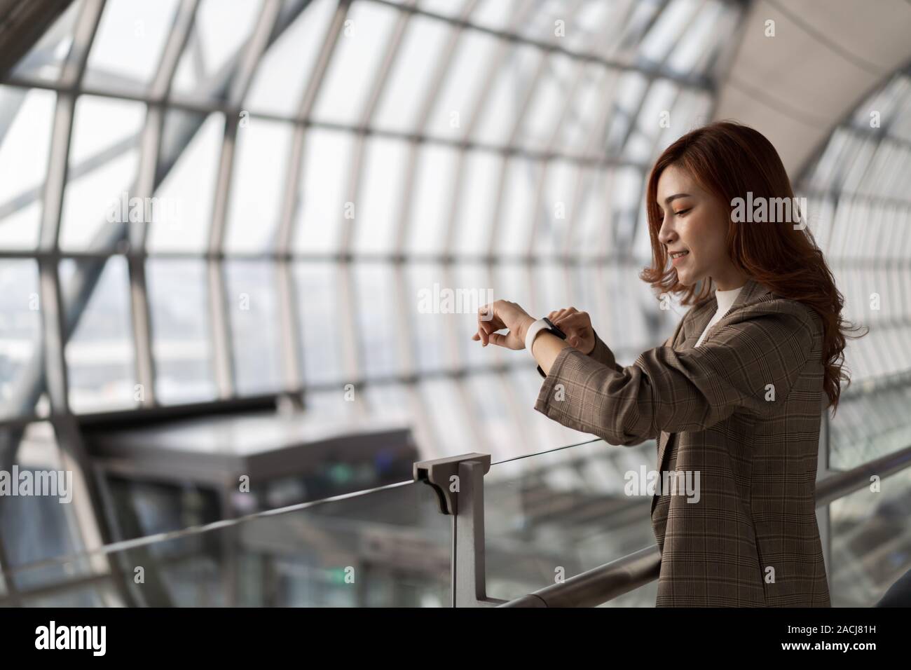 Beautiful business woman waiting airport hi-res stock photography and ...