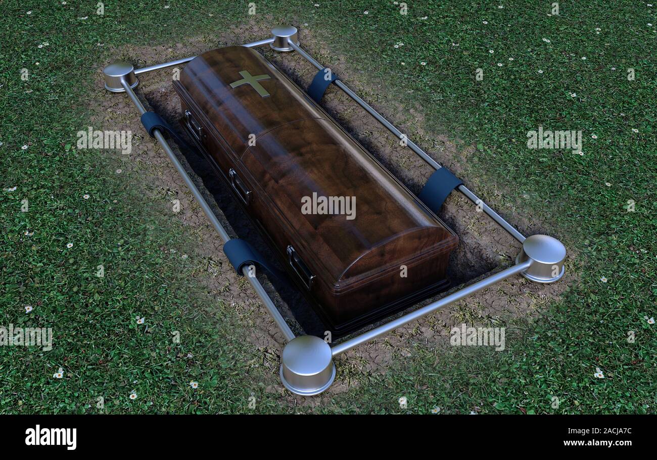 A modern wooden coffin at a funeral being lowered into a grave with a lowering mechanism a dirt and grass background - 3D Render Stock Photo