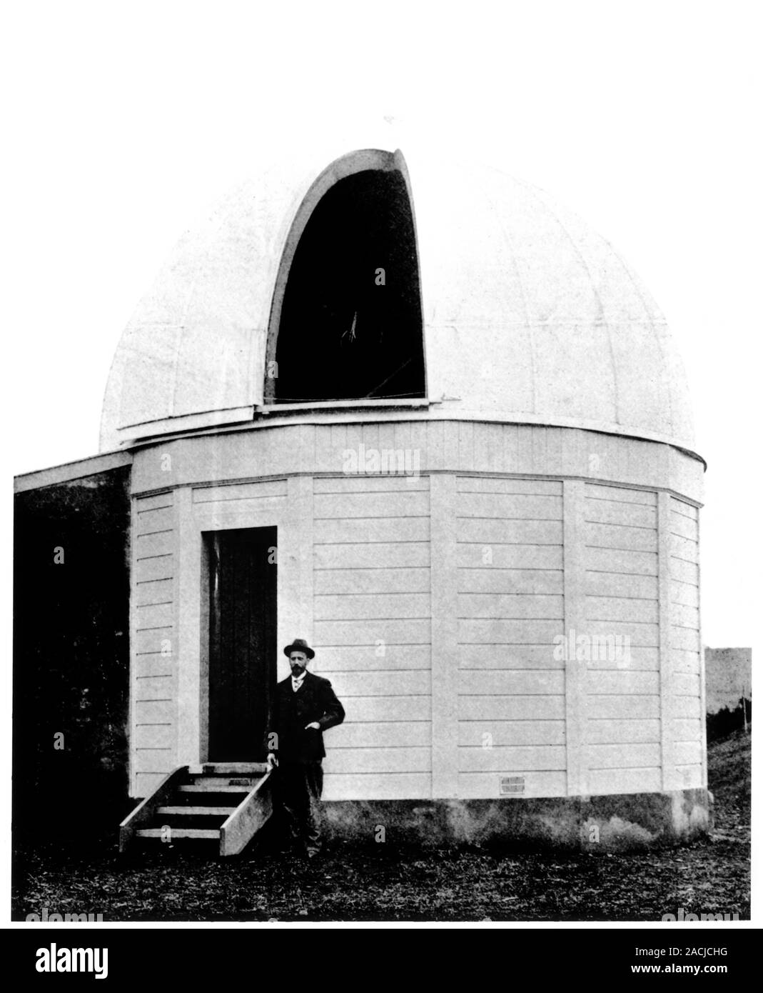 Wanganui Observatory. Astronomer standing outside the telescope dome at the  Wanganui Observatory in Wanganui, New Zealand. It was later named the Ward  Stock Photo - Alamy