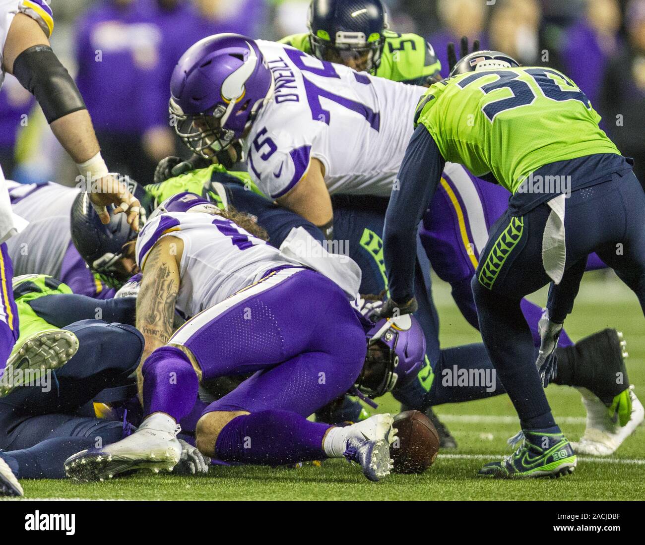 Seattle, United States. 02nd Dec, 2019. Seattle Seahawks strong safety Bradley McDougald (30) recovers a fumble by Minnesota Vikings running back Dalvin Cook (33) during the third quarter at CenturyLink Field in a Monday Night Football game on December 2, 2019 in Seattle, Washington. The Seahawks beat the Vikings 37-30. Photo by Jim Bryant/UPI Credit: UPI/Alamy Live News Stock Photo