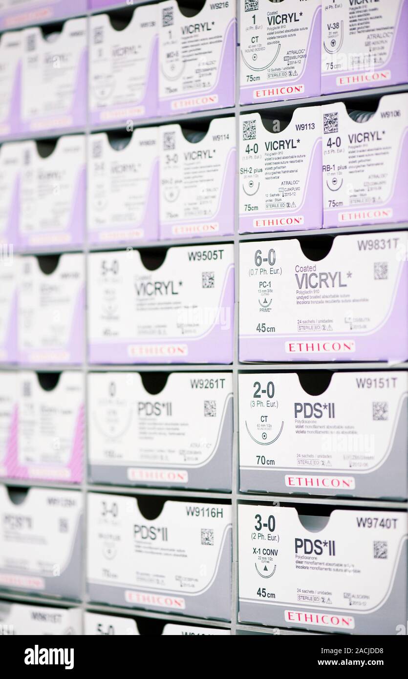 Suture rack. Rows of boxes containing different types and sizes of