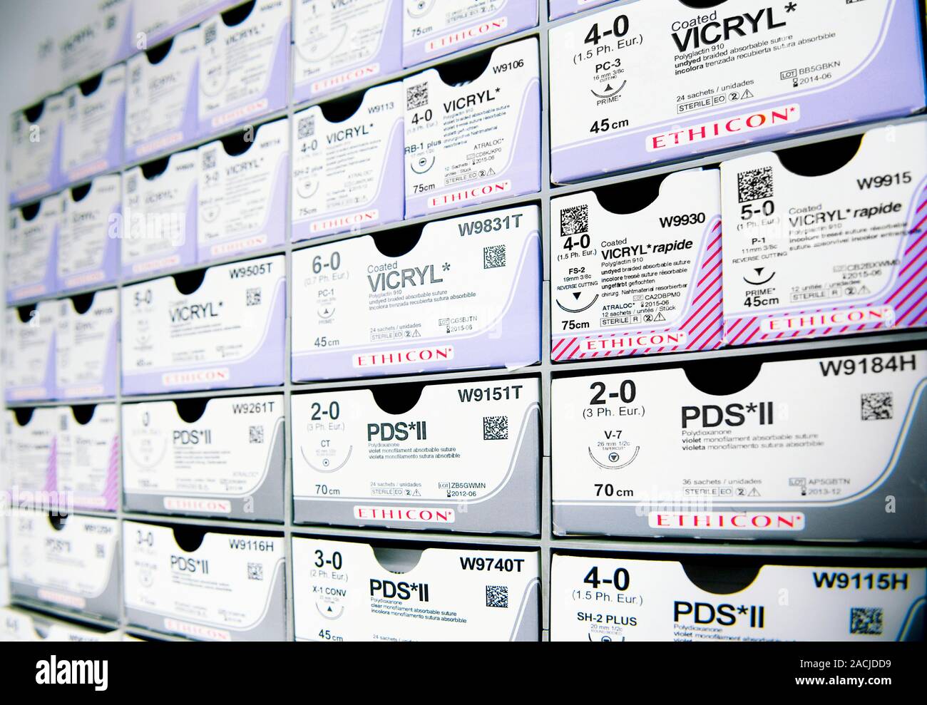 Suture rack. Rows of boxes containing different types and sizes of