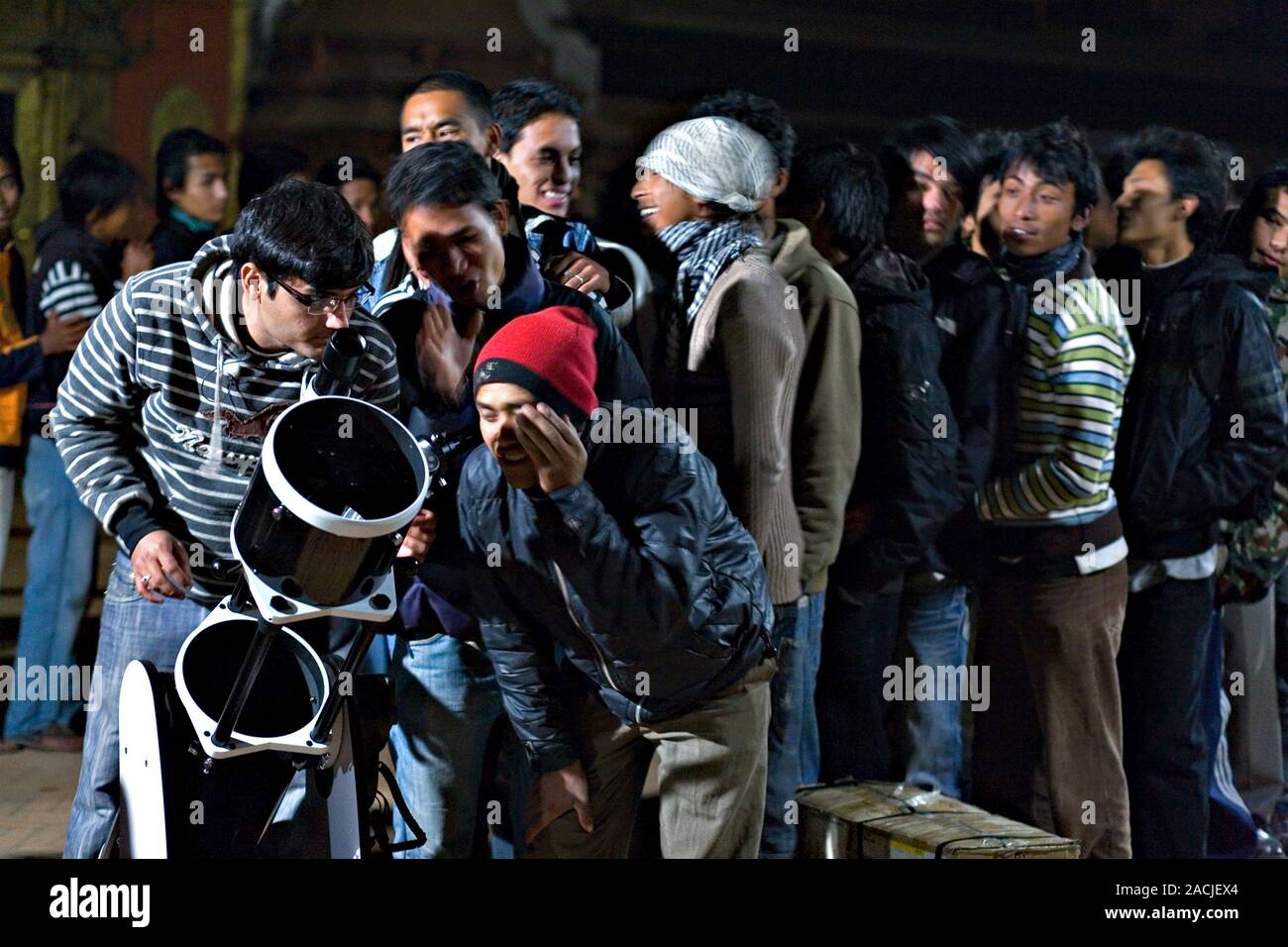 In a star party by amateur astronomers, the young people of Bhaktapur are gathered see Moon through a telescope the first time. Star Stock Photo - Alamy