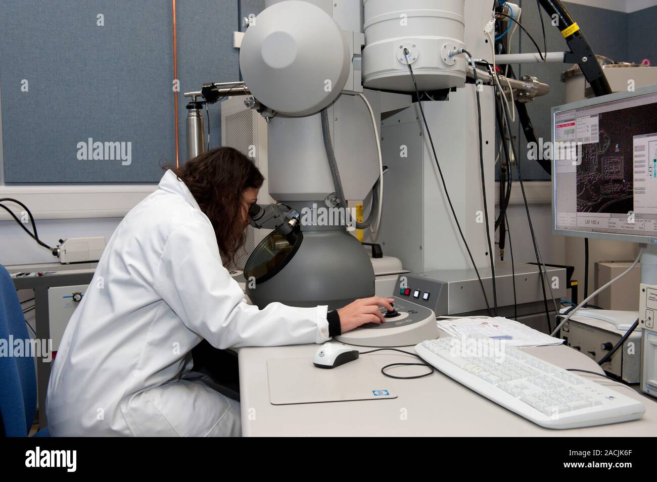 Transmission electron microscopy. Scientist using a transmission