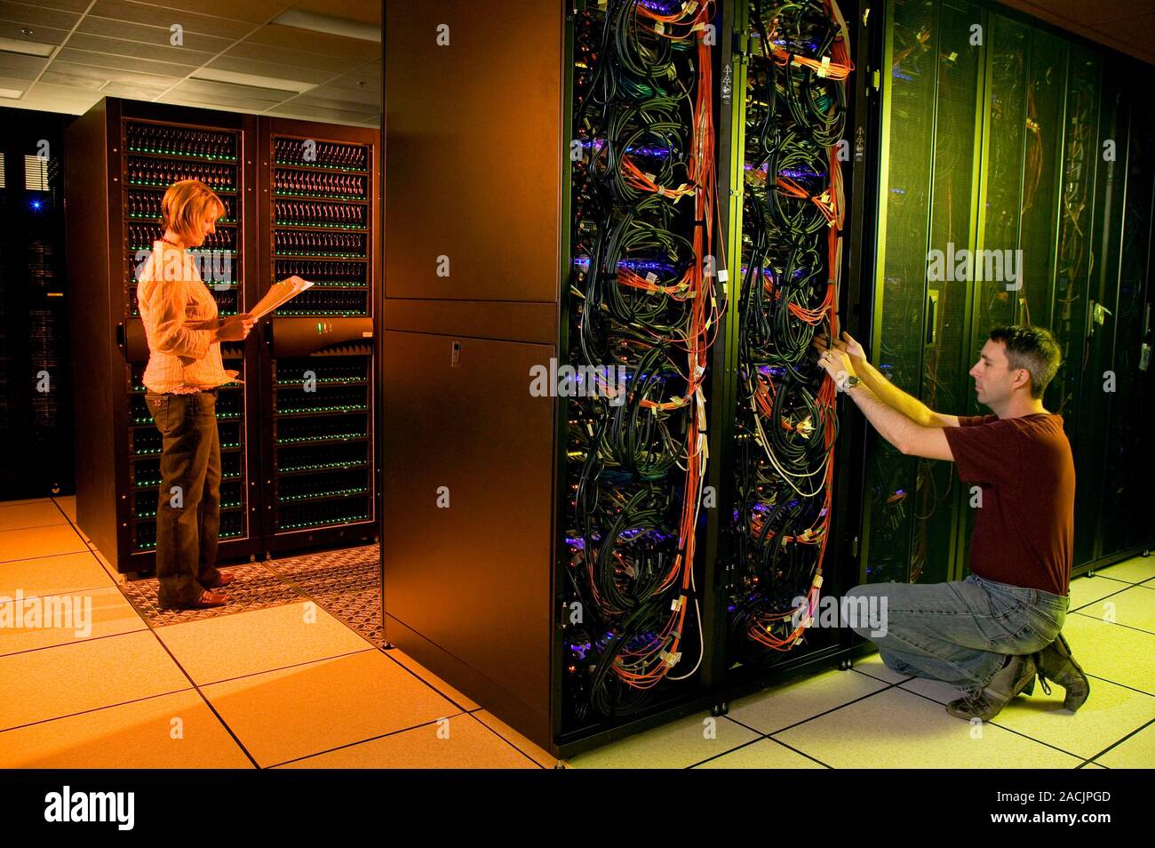 Hyperion supercomputer. Researchers working on units of the Hyperion supercomputer. This is a next-generation supercomputer based on Linux clusters, b Stock Photo
