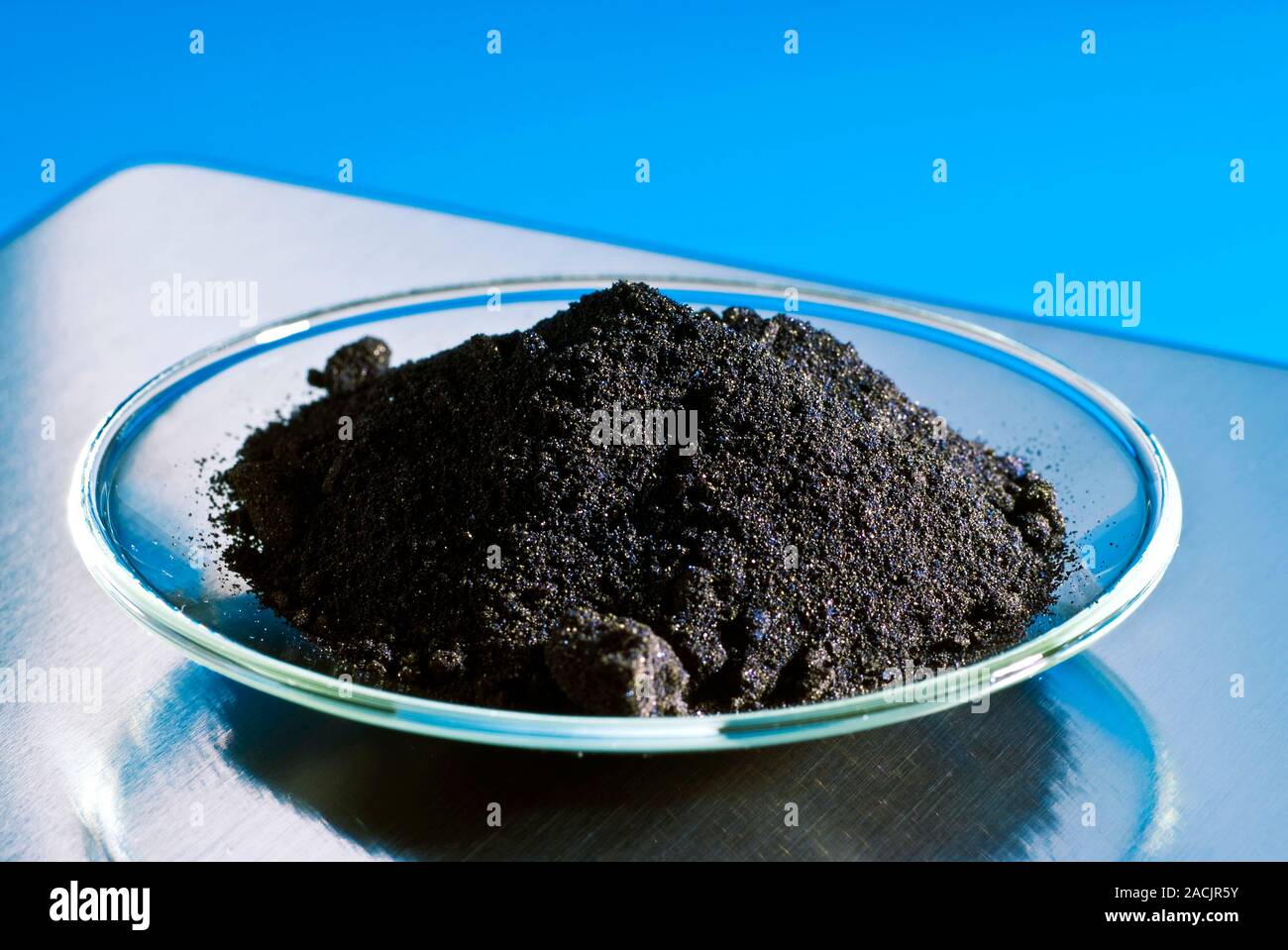 Anhydrous iron (III) chloride (FeCl3). Also called ferric chloride, the