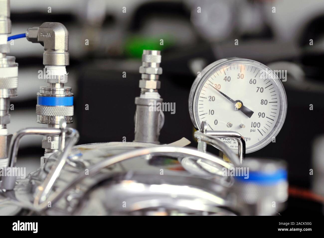 Pump gauge. Closeup of the pressure gauge on a cooling pump Stock