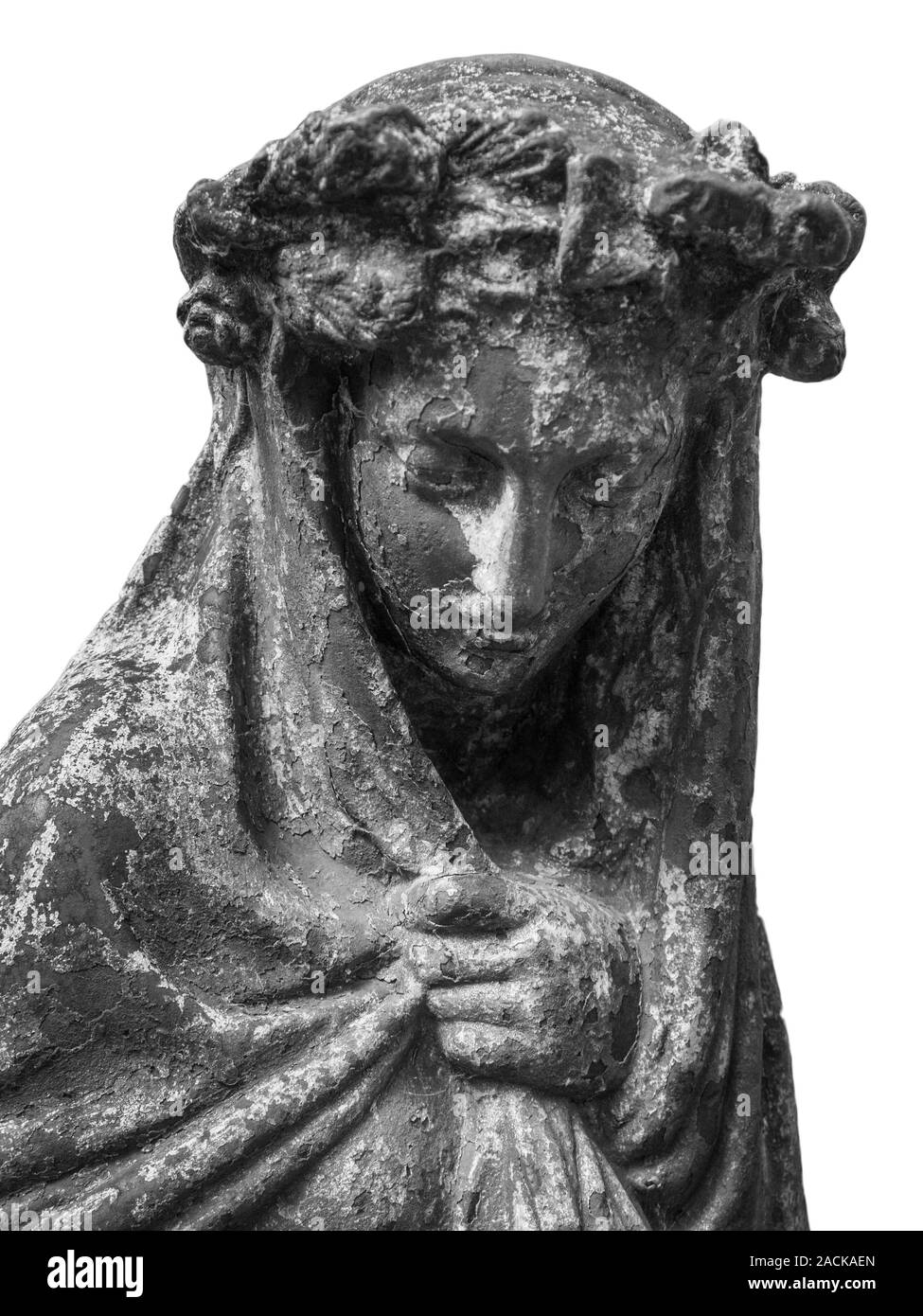 Close up of an old grunge statue representing a suffering young woman with a hand in her forehead. Rusty statue of a detail of an old marble fombstone Stock Photo