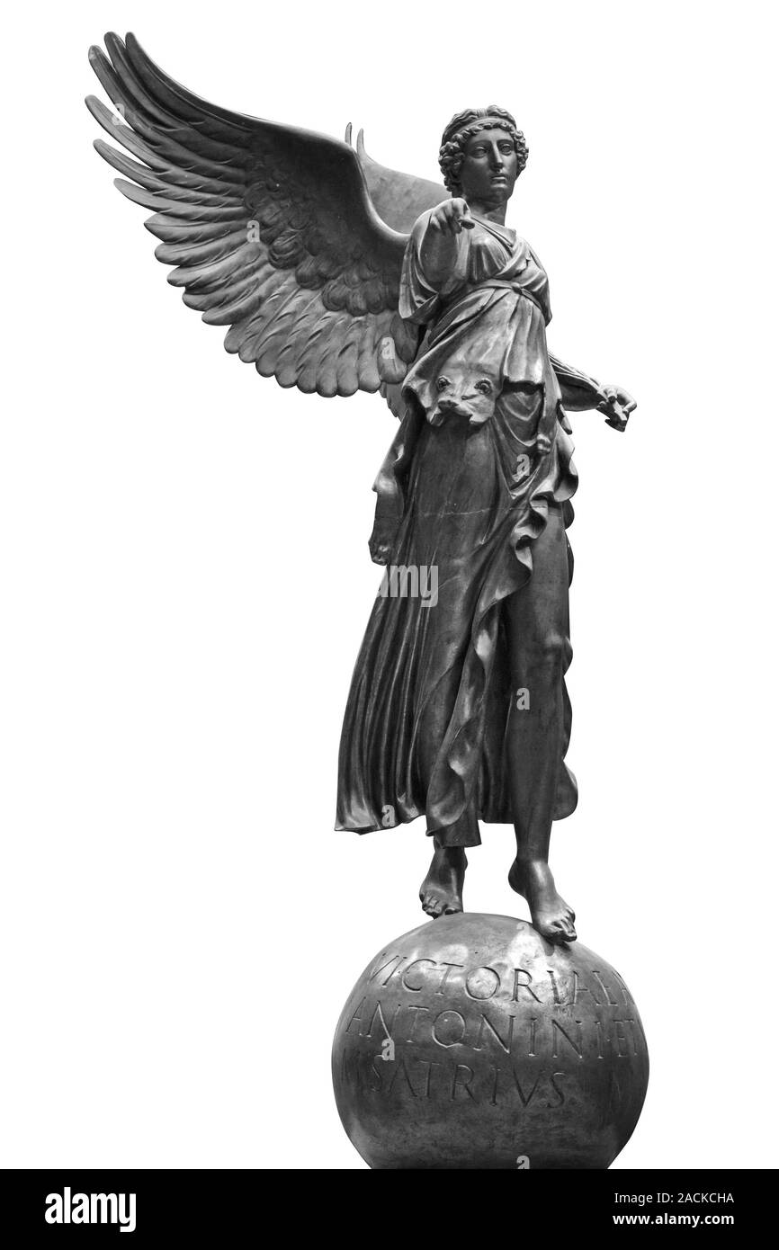 Bronze statue of a Winged Victory. Frontal view of a Statue of the goddess Nike, isolated on white background by clipping path. Stock Photo