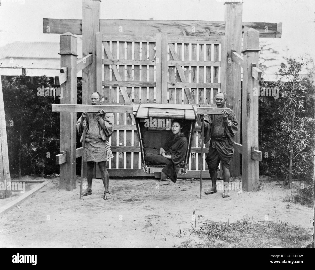 Japanese carrying litter. Woman in a carrying litter in Japan