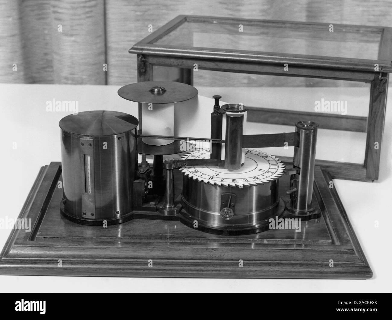 Meteorological equipment including a timing and recording drum. This ...
