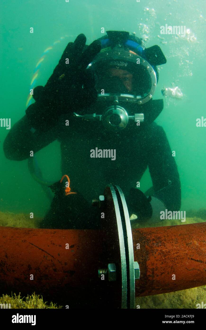 Professional diver. Commercial surfacesupplied diver working
