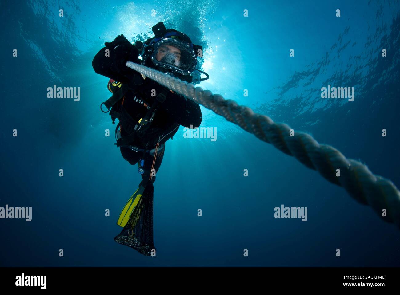 Professional diver. Commercial surfacesupplied diver working