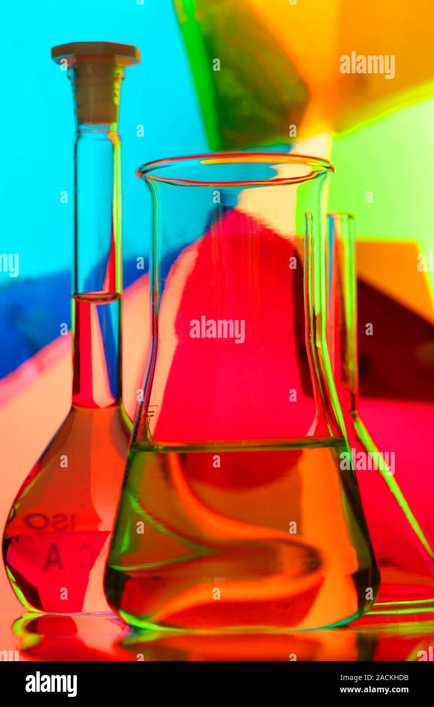 Glassware in a laboratory including a funnel and volumetric flasks Stock Photo Alamy