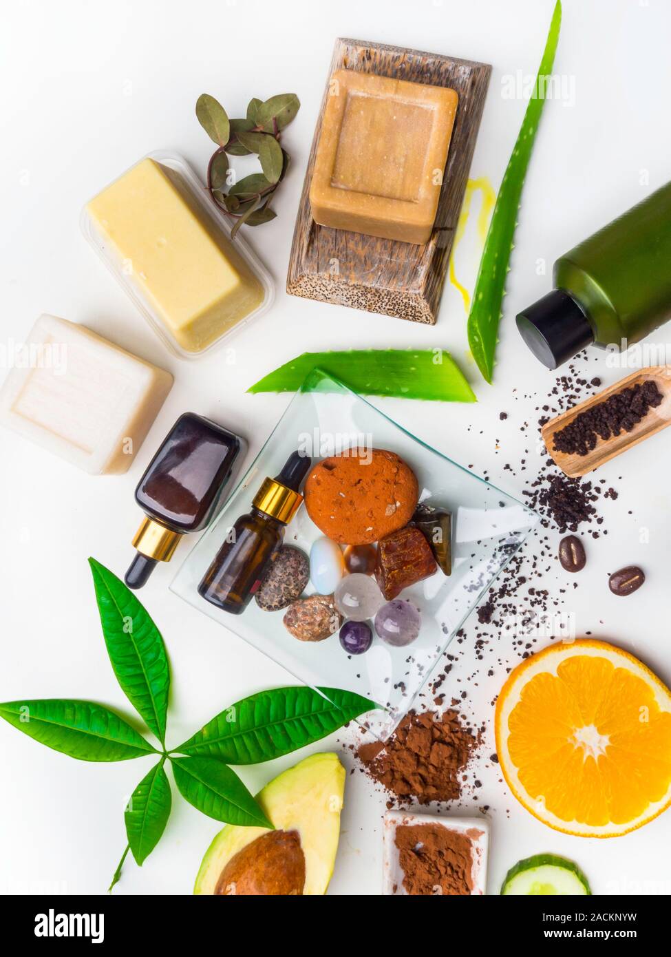 beauty and organic spa products, skincare natural ingredients,, acessories,  serum, soap, scrub, oil, cocoa butter, stone for massage, orange, avocado  Stock Photo - Alamy