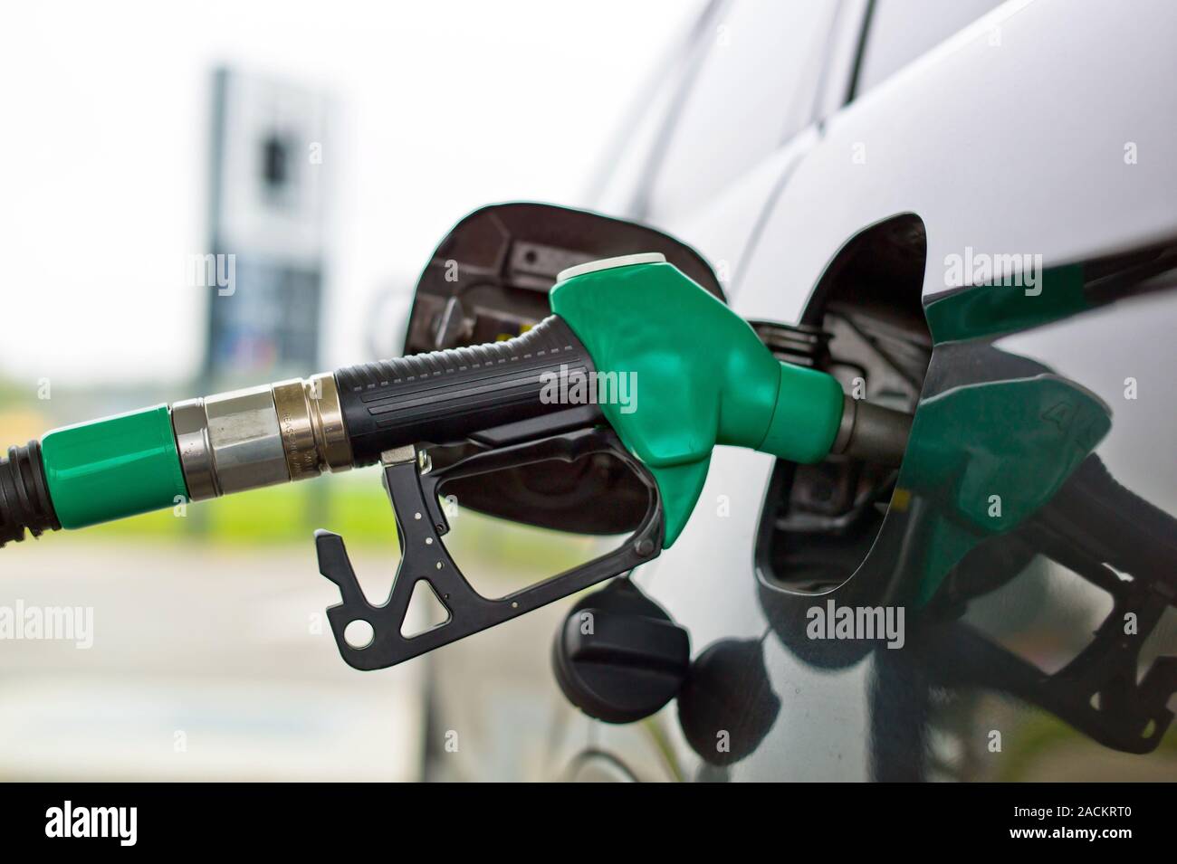 Petrol tap for a filling station Stock Photo Alamy