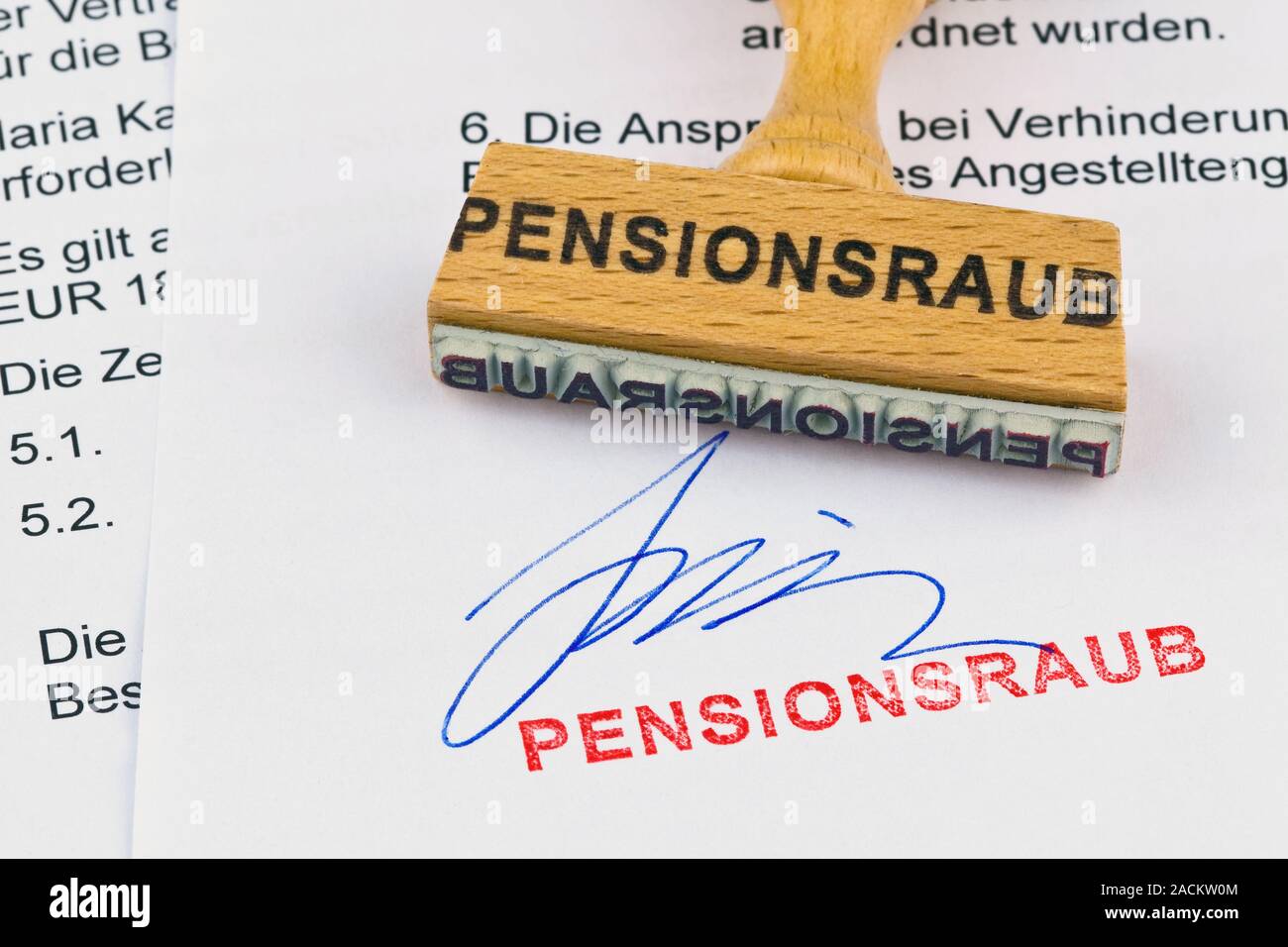 Wood stamp on document: Pensionsraub Stock Photo
