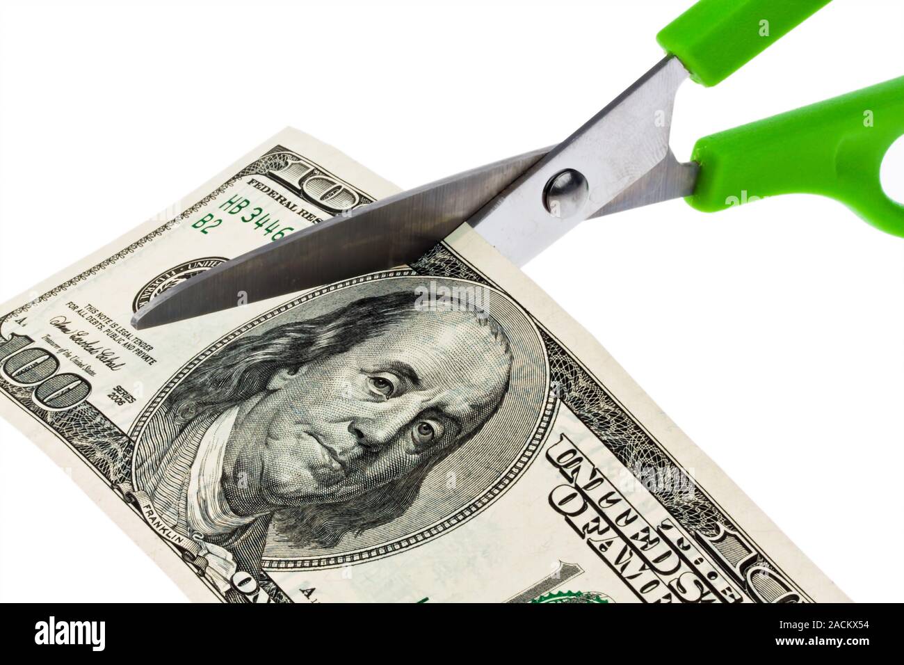Dollar banknotes and scissors Stock Photo - Alamy