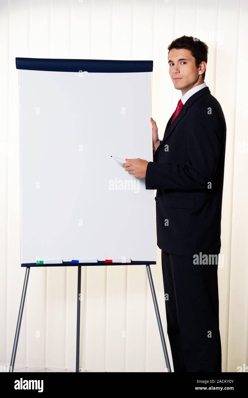 Businessman with flipchart Stock Photo