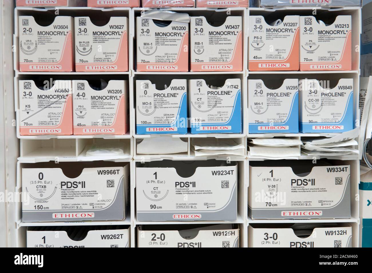 Suture rack. Rows of boxes containing different types and sizes of