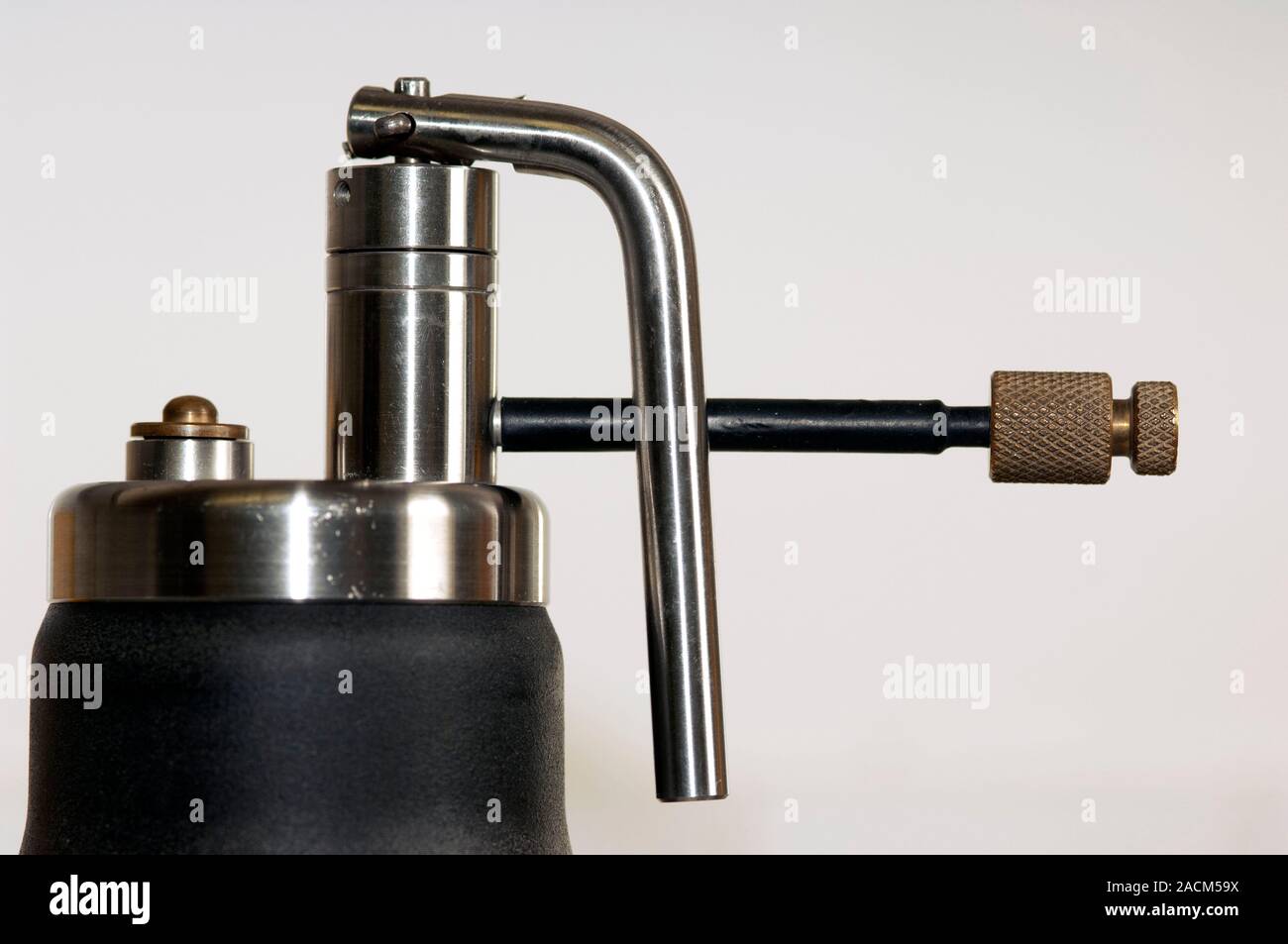Liquid nitrogen cryotherapy nozzle (at right) attached to a flask that