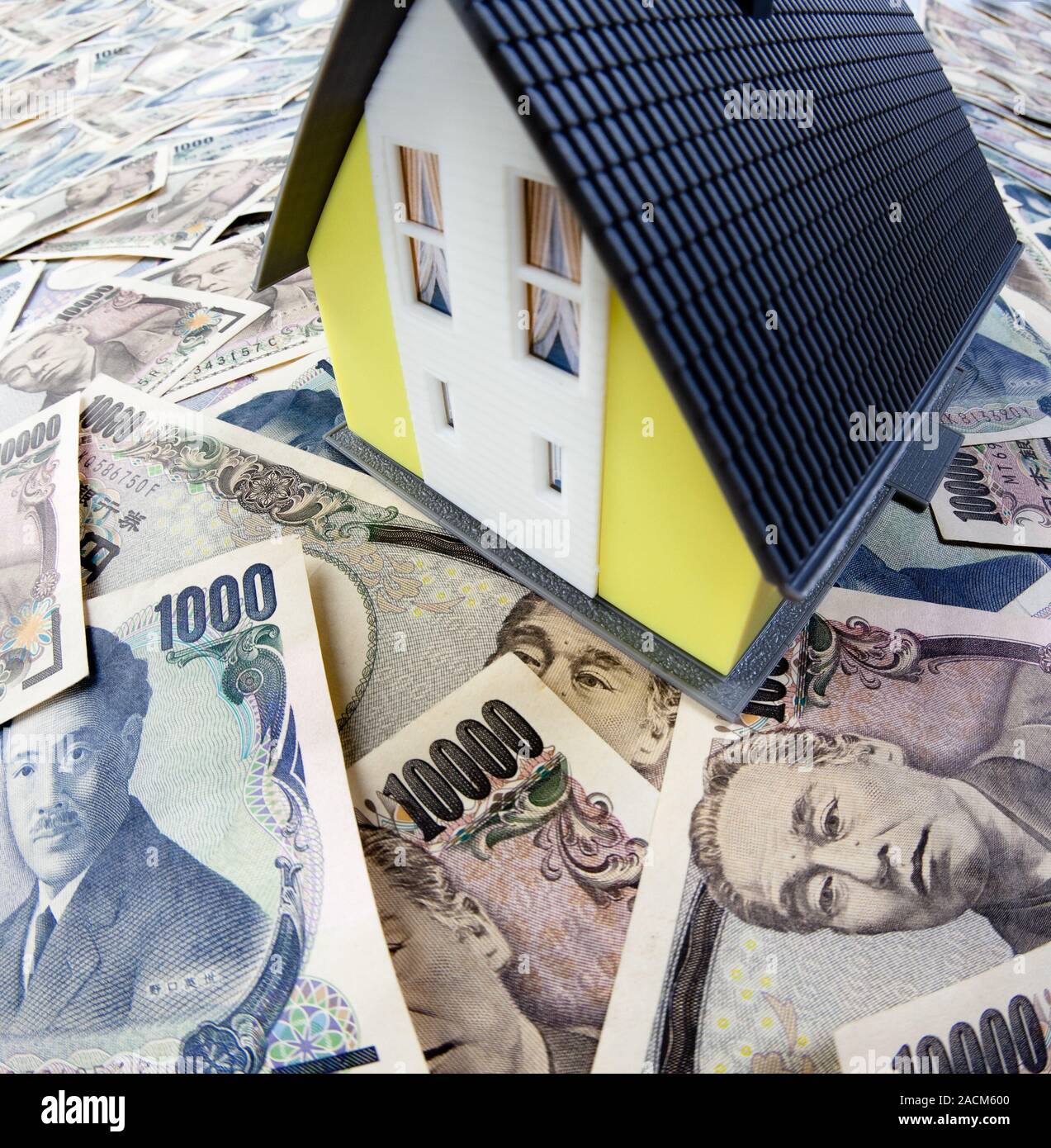 Japanese yen and house Stock Photo Alamy