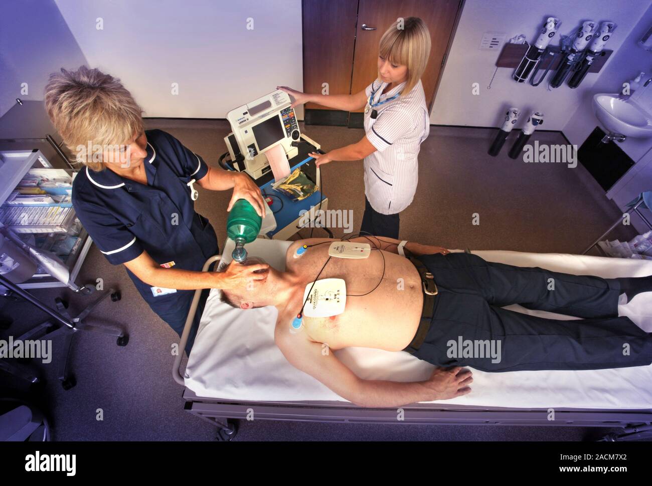 Intensive care nurse provides artificial respiration during ...
