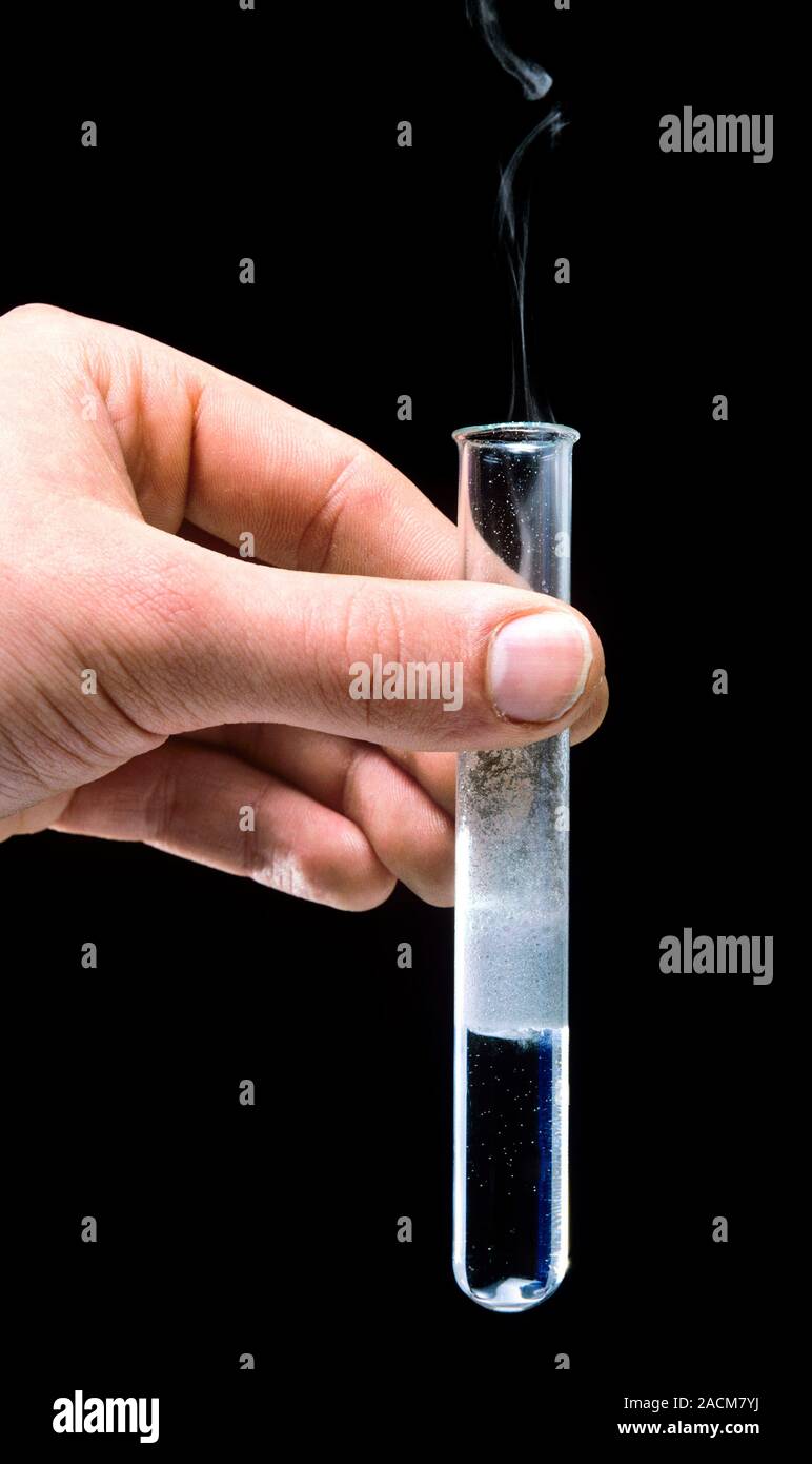 Magnesiumacid reaction. Magnesium reacting with an acid in a test tube
