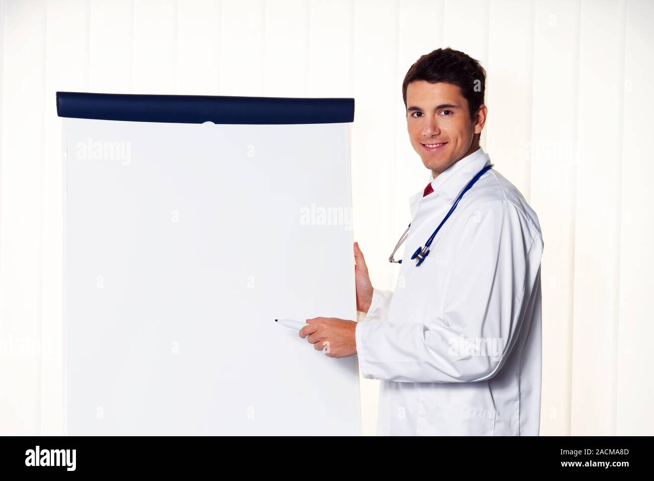 Successful doctor with flipchart Stock Photo