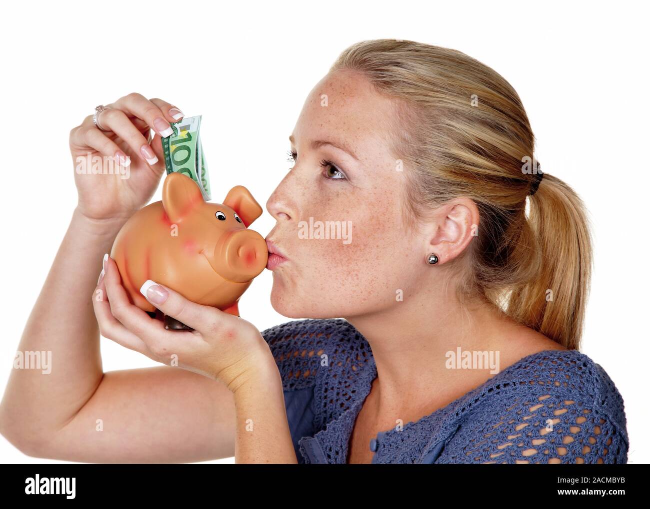 young woman with piggy bank Stock Photo - Alamy