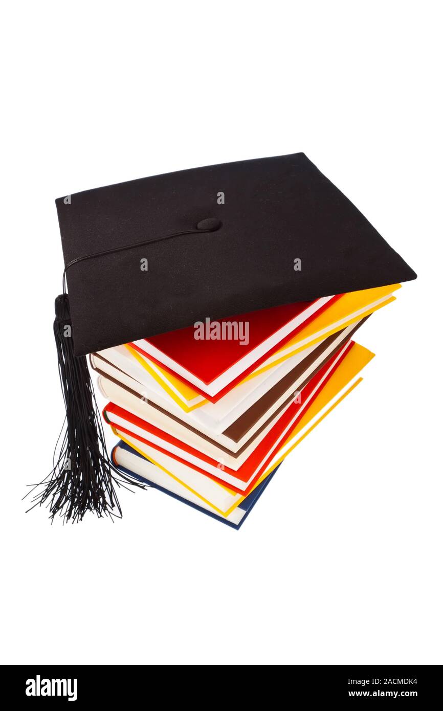 Doctor's hat on a book stack Stock Photo - Alamy