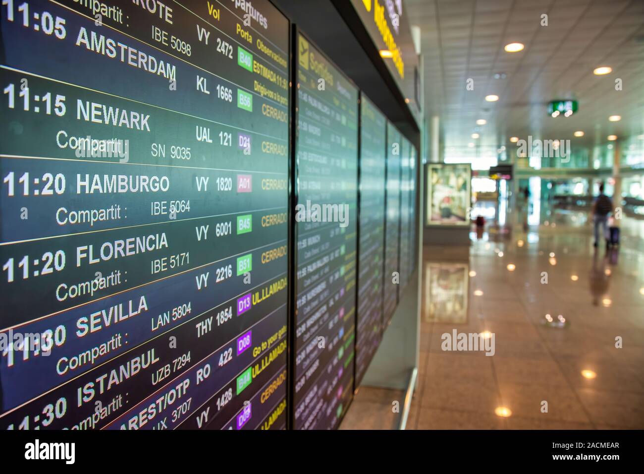 Information monitor with timetable in airport Barcelona in Spain Stock Photo