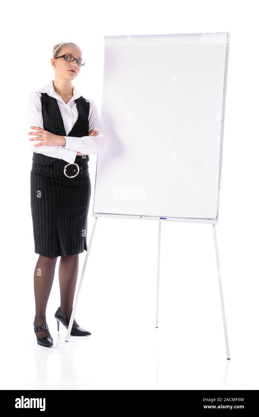 Young manager, tax consultant in front of flipchart Stock Photo