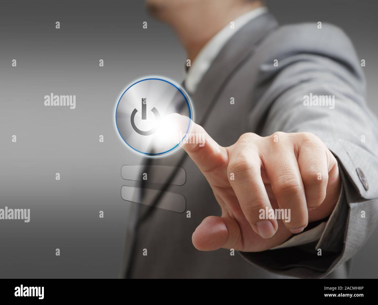 hand pushing a button on a touch screen interface Stock Photo