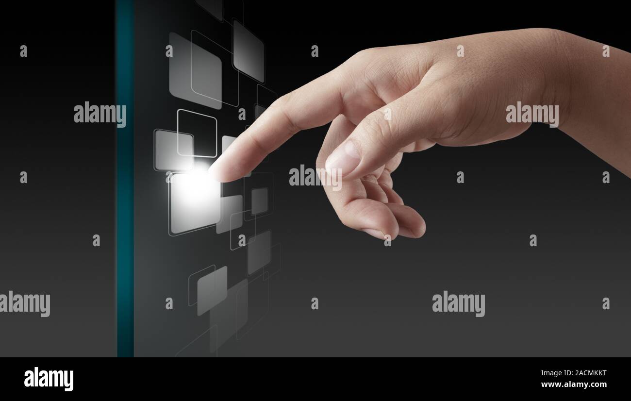 hand working on modern technology Stock Photo
