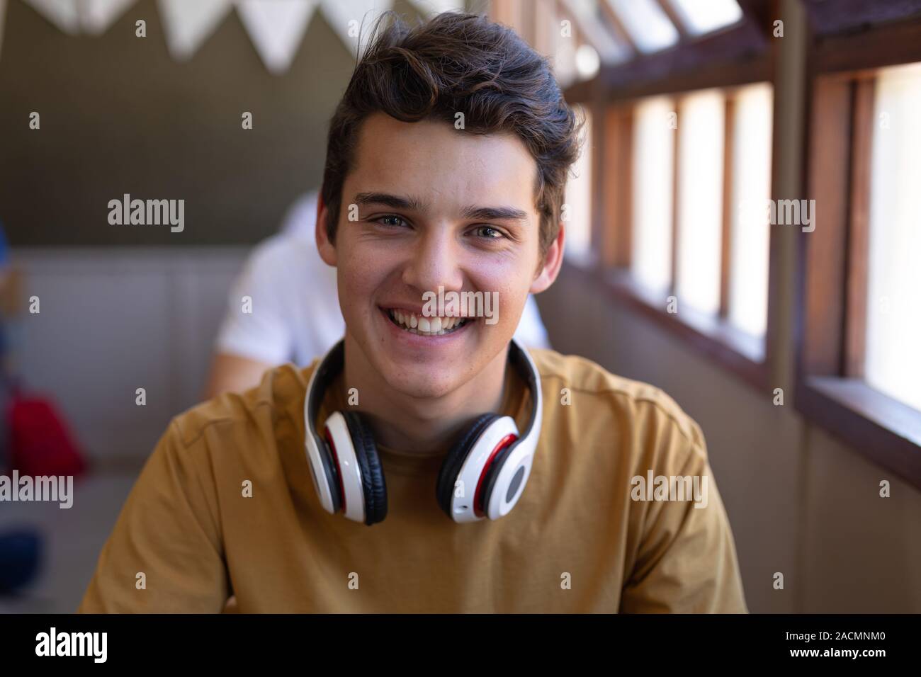 Teenagers in school classroom Stock Photo - Alamy
