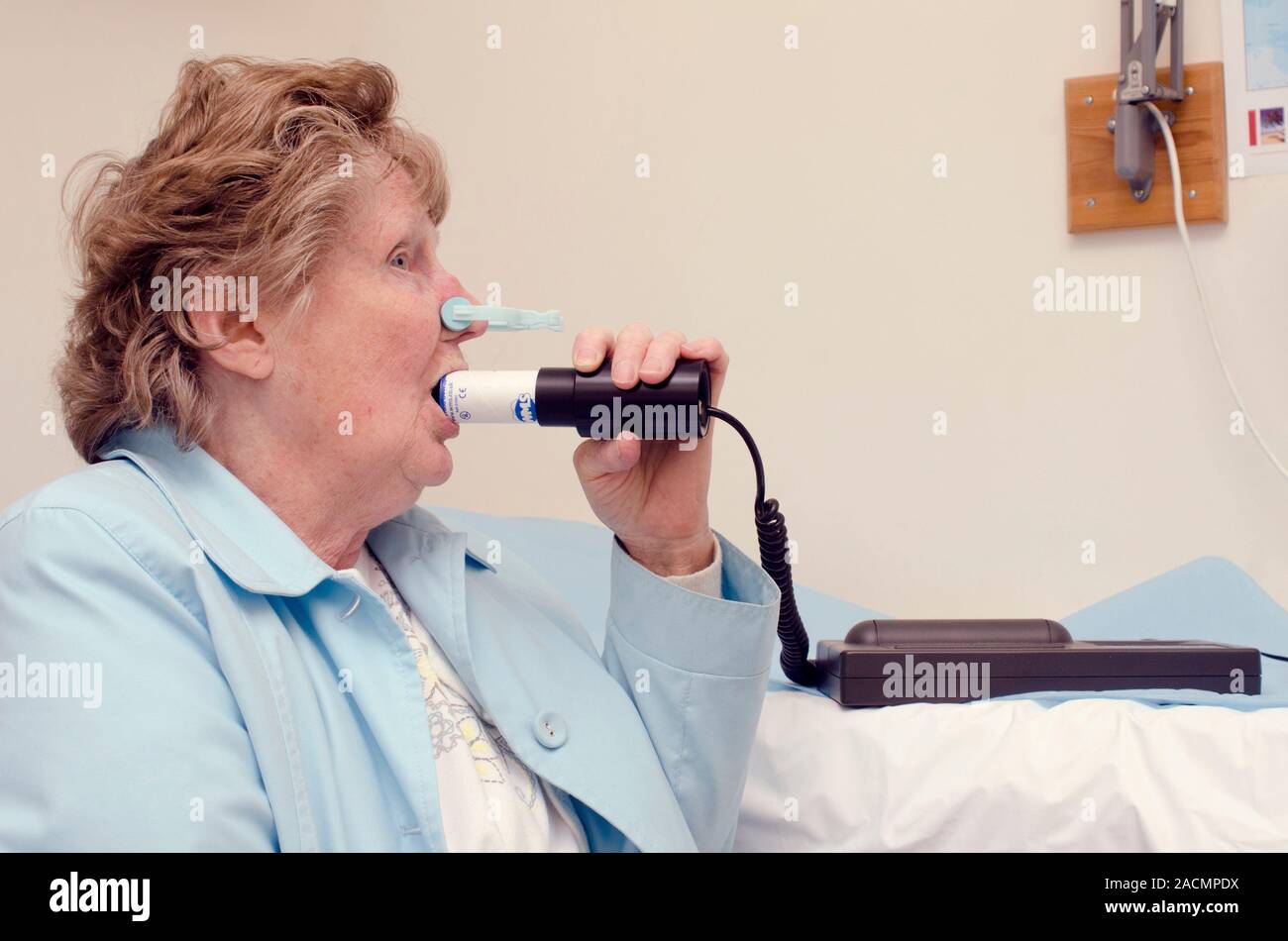 Lung function test (spirometry) of a 70 year old female patient with ...