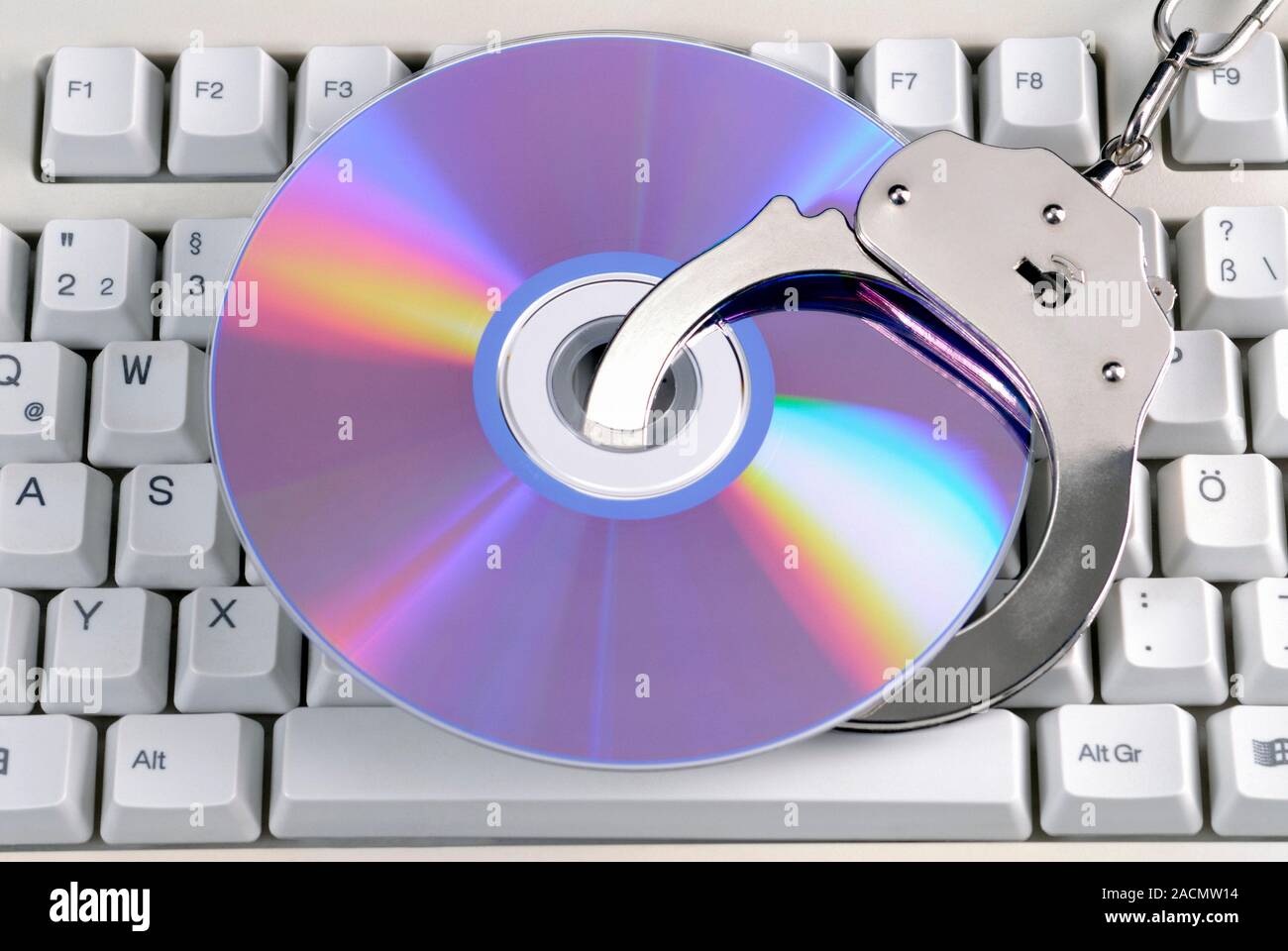 Software piracy, conceptual image. Image representing the illegal copying of computer software and other data. Stock Photo