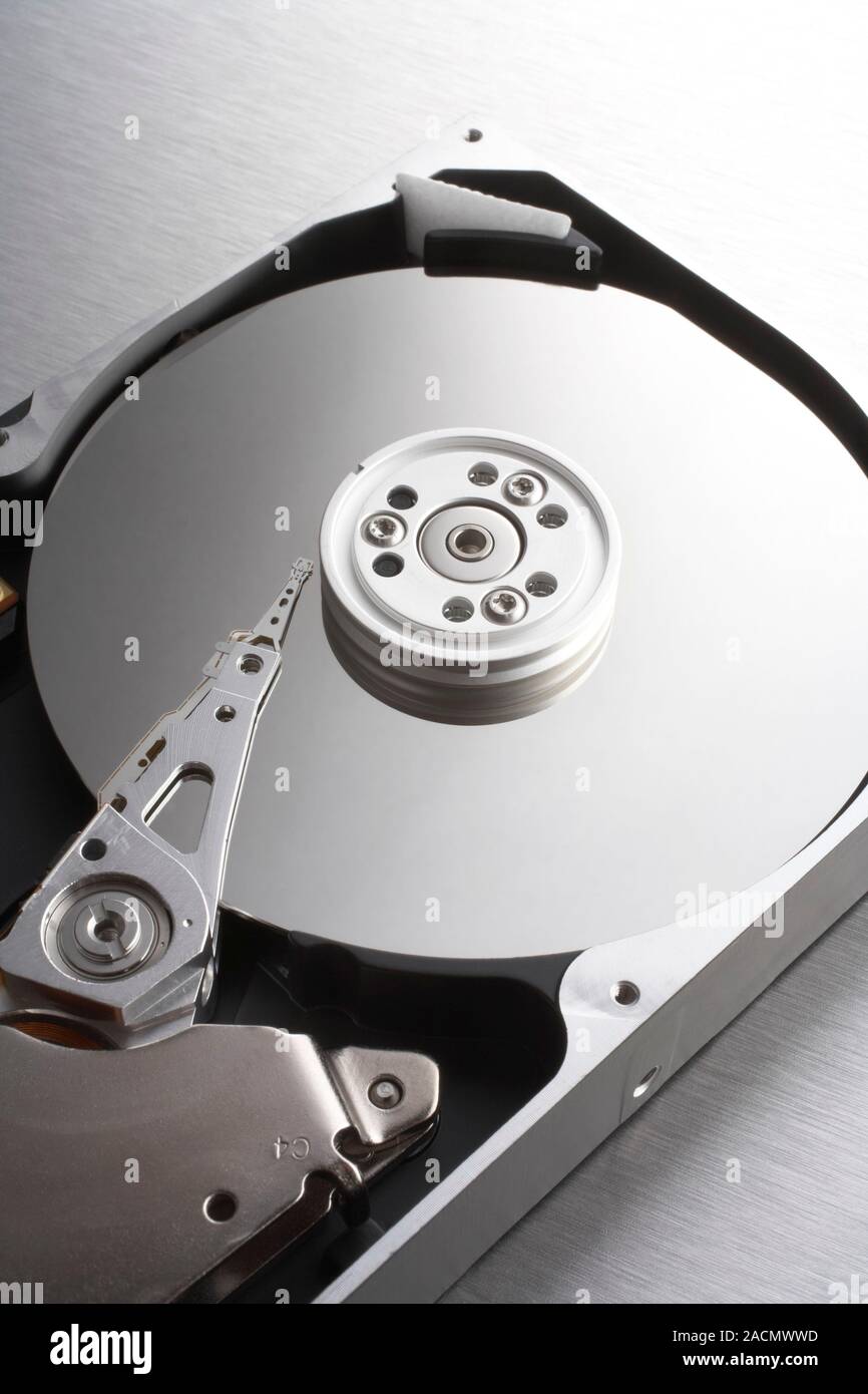 Dysprosium-containing hard disk drive. Computer hard drives are used to  read and record data on magnetic materials. The magnetic storage media  takes t Stock Photo - Alamy