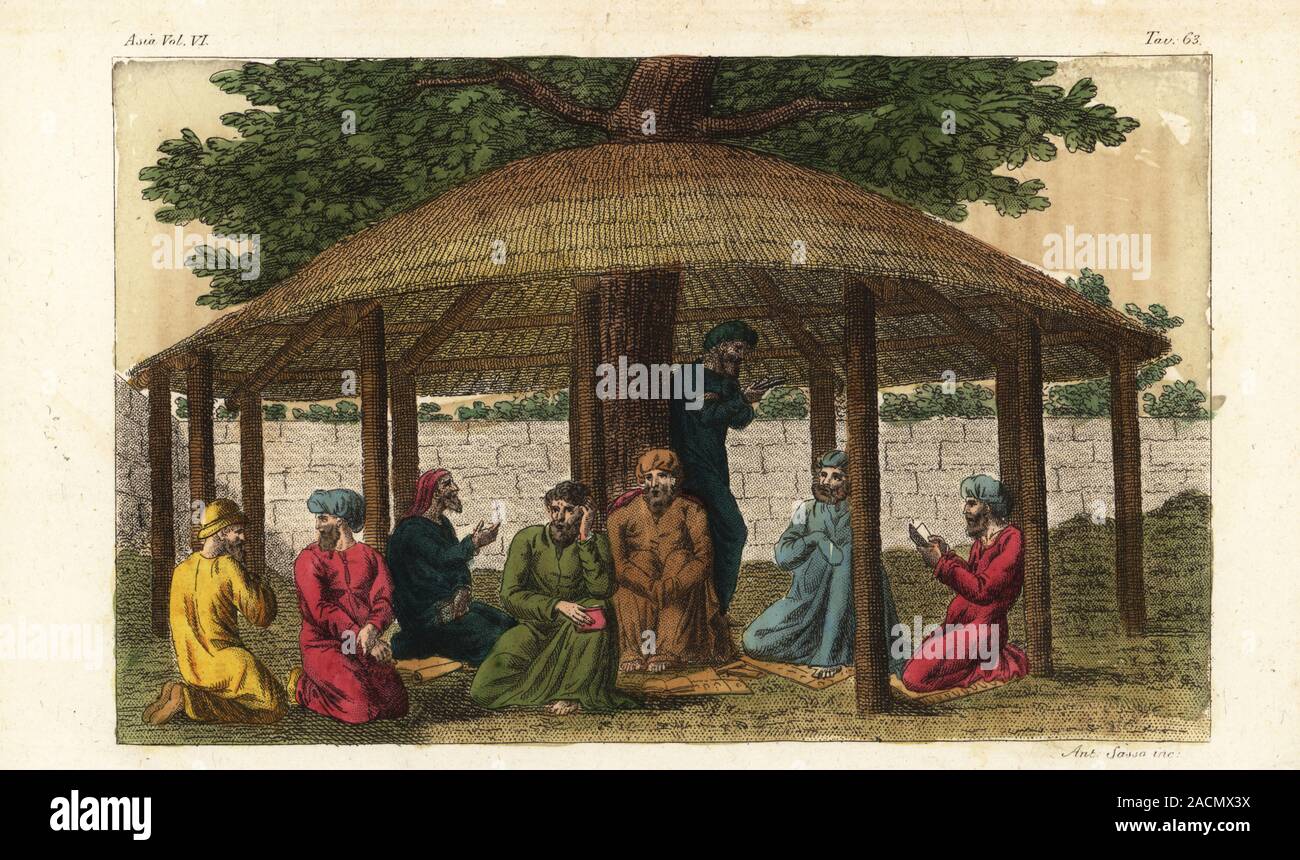 Sufi mystics of ancient Persian Zoroastrianism read prayer books under a thatched hut. I sofi. Handcoloured copperplate engraving by Giovanni Antonio Sasso from Giulio Ferrario’s Costumes Ancient and Modern of the Peoples of the World, Il Costume Antico e Moderno, Florence, 1847. Stock Photo